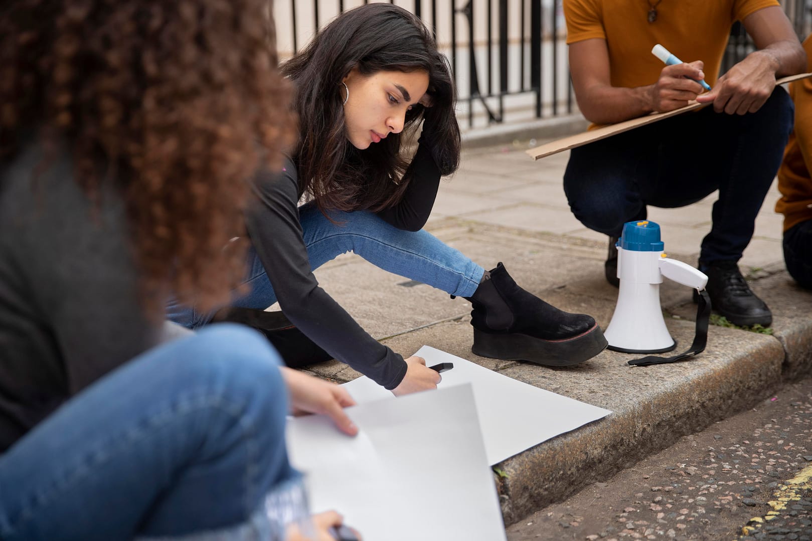 people writing placards close up